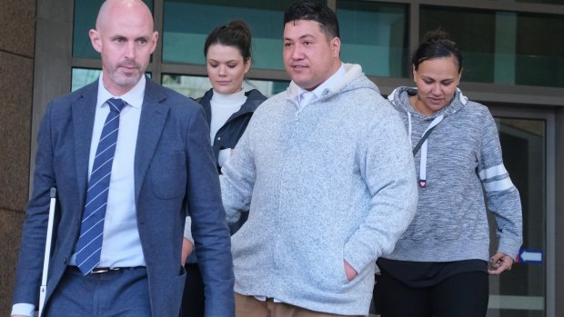 Hayden Tarawa (centre) at the Melbourne Magistrates Court. 