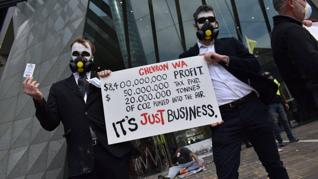 Extinction Rebellion protesters target the Perth HQ of Chevron on Friday morning.