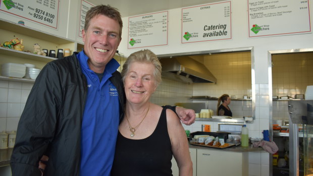 Pearce MP Christian Porter with cafe owner Mandy Smith. The Attorney General was campaigning at a prepolling station near his electorate.