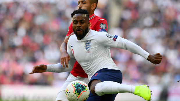 Danny Rose of England wraps his boot around the ball against Bulgaria at Wembley.