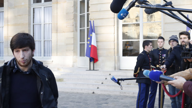 Jason Herbert, a member of the so-called yellow jackets movement, leaves the Prime Minister's office in Paris. 