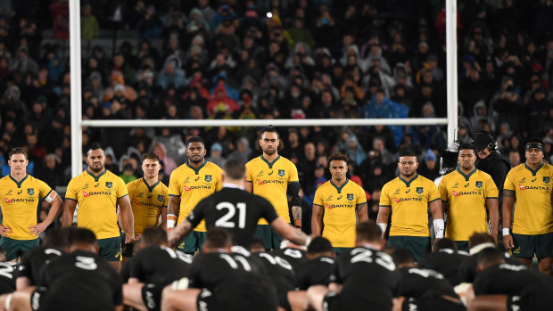 Wallabies players watch the All Blacks perform the Haka during a Bledisloe Cup match in August, 2019.