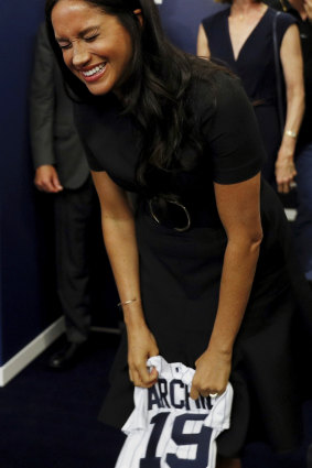 Meghan, Duchess of Sussex, receives a present for baby Archie from New York Yankees last month.