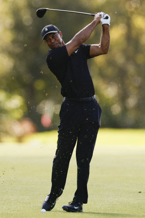 Tiger Woods hits from the fairway in Orlando.