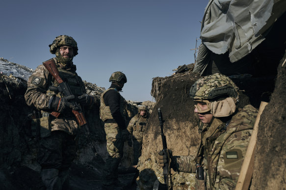 Soldiers of the Ukrainian 3rd Army Assault Brigade of the Special Operations Forces (SSO) “Azov” in a trench in position near Bakhmut, Donetsk region on Saturday, February 11.