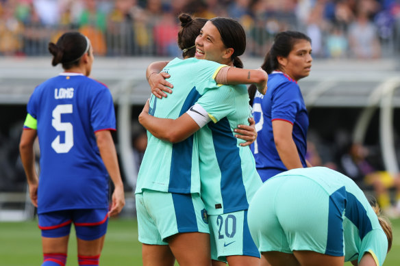 Sam Kerr and Caitlin Foord celebrate.