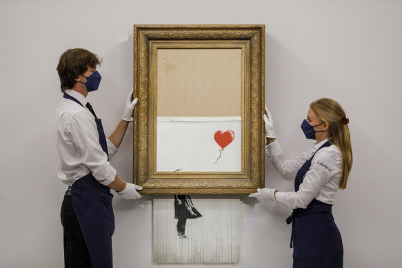 Banksy’s “Love is the Bin” before auction. 