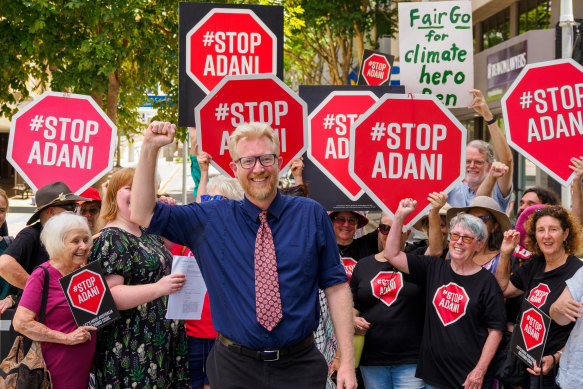 Pennings celebrates the win with other activists in Brisbane.