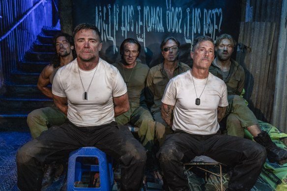 A bunch of Australian soldiers are supposedly taken hostage by freedom fighters on the fictional island of Behati-Prinsloo in the madcap satire C*A*U*G*H*T.