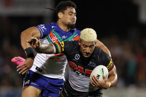 Penrith Viliame Kikau makes an inroad into the Warriors’ defence on Friday night.
