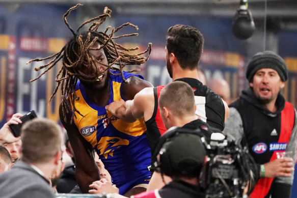 A melee started after Zach Merrett pulled one of Nic Naitanui's dreadlocks, with the big Eagle then shoving the Bomber.