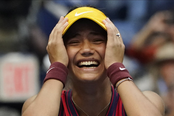 Raducanu reacts after her stunning victory.