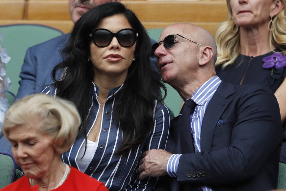  Jeff Bezos with Lauren Sanchez at Wimbledon in July last year.