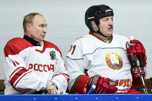 Russian President Vladimir Putin, left, and Belarusian President Alexander Lukashenko pause during a hockey match in Strelna, Russia, last December.