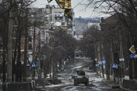 Ukrainian soldiers ride in a Humvee in Bakhmut, Donetsk region, Ukraine, on December 21.
