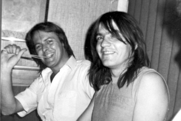 Crispin Dye (left) with AC/DC star Malcolm Young.