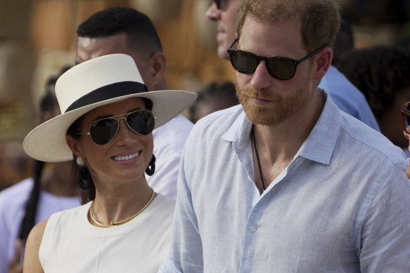 Prince Harry and Meghan arrive to San Basilio de Palenque, Colombia, in August.