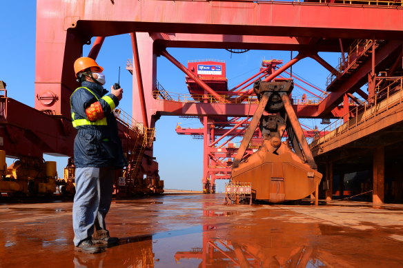 A ship unloader at Taicang port unloading iron ore imported from Australia, Brazil and other countries. Prices for the metal have been sinking amid lower demand from China.