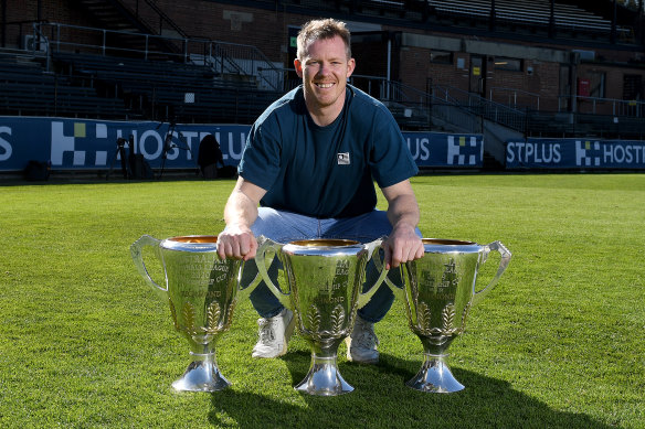 Jack Riewoldt with the 2017, 19 and 20 premiership cups.