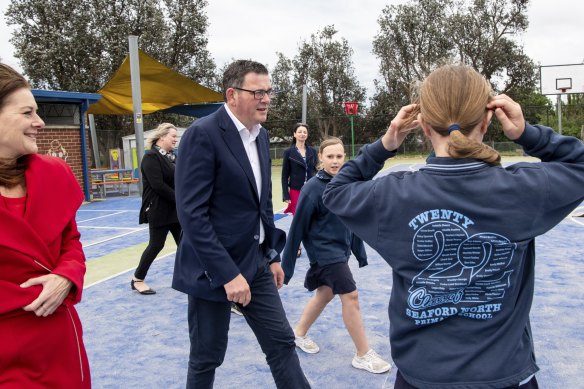 Then-premier Daniel Andrews announces the schools package on the campaign trail during the 2022 election campaign, with Planning Minister Sonya Kilkenny (left).