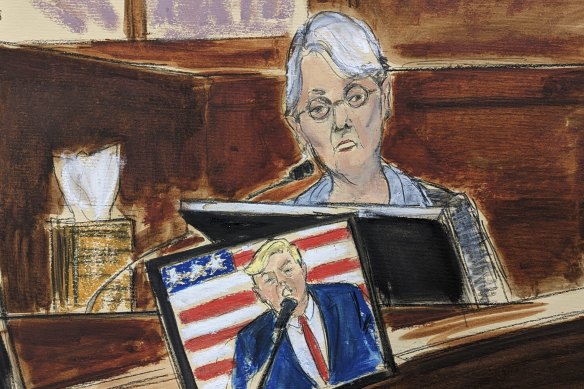 Trump accuser Jessica Leeds testifies in support of writer E. Jean Carroll in Manhattan on Tuesday. Video of Donald Trump is seen on a screen during the hearing.