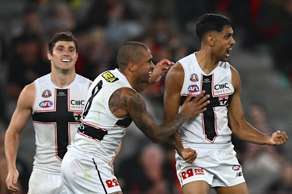 Wanganeen-Milera celebrates a goal with Brad Hill during the Saints round seven clash with the Lions. 