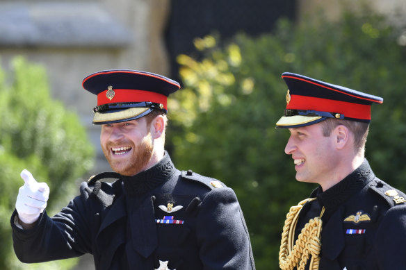 Britain’s Prince Harry, left, and Prince William arrive for the wedding ceremony of Prince Harry and Meghan Markle at St. George’s Chapel in Windsor Castle in Windsor, near London, England, Saturday, May 19, 2018. 