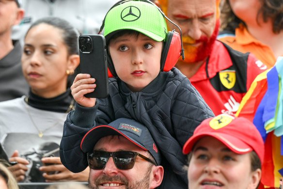 A young motorsport fan gets into the spirit.