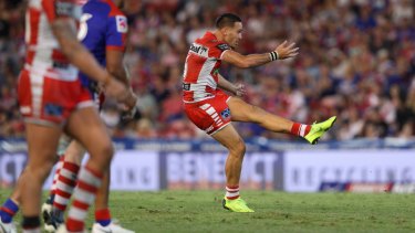 Corey Norman kicks the match-winning field goal for the Dragons. 