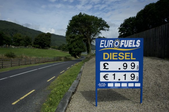A petrol station sign with prices in euros and pounds, near the border between the Republic of Ireland and Northern Ireland in Omeath.