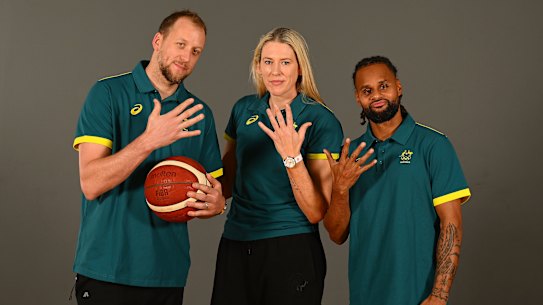 Joe Ingles, Lauren Jackson and Patty Mills pose after being selected for their fifth Olympics.