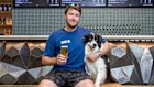 Rocky Ridge’s co-founder and managing director Hamish Coates, with his border collie Jack, at the Perth brewery.