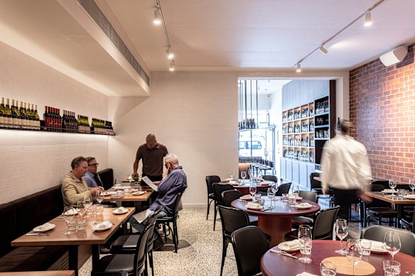 Bar Sophia's dining room is fitted out in polished concrete, brick and glossy, rendered plaster.
