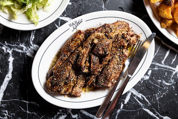 Thick, bone-in lamb chops are braised overnight in lamb stock.