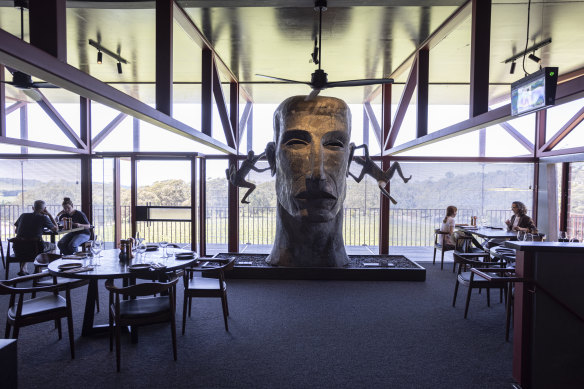 The sculpture of a huge, pressed-tin head by Richard Stringer. 