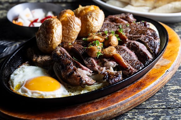 Sizzling steak platter.