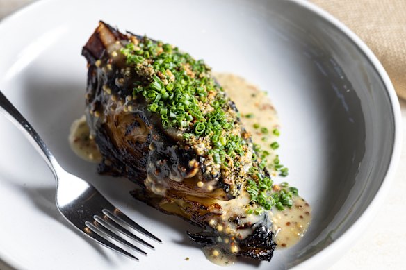 Braised, grilled and baked cabbage with fermented mustard seeds and rye crumbs.