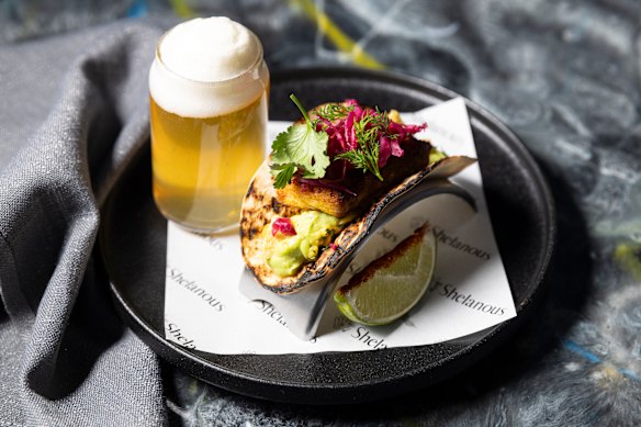 Barramundi taco with avocado cream.