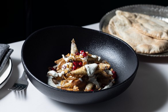 Whitebait fatteh, layered with yoghurt and crunchy pita.