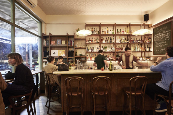 Frilly light fittings above the bar.