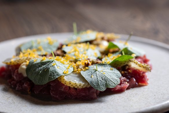 Beef tartare with green strawberries. 