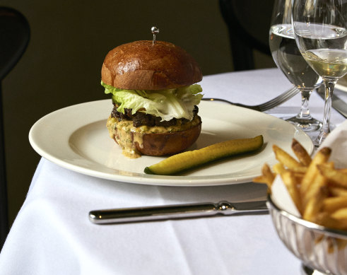 A cheeseburger and beer on tap is part of the relaxed offering.