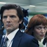 This image released by Apple TV+. shows Adam Scott, left, and Britt Lower in a scene from “Severance.” (Apple TV+ via AP)
