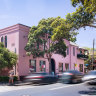 The rose-pink facade of Queens Court in Woollahra.