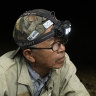 Takamatsu Gushiken leaves a cave after a session of searching for the remains of those who died during the Battle of Okinawa, in Itoman, Okinawa archipelago, southern Japan.