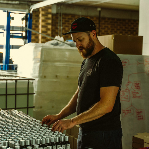 Luke Swenson inspects his inventory at The Bearded Chap’s Queensland factory.