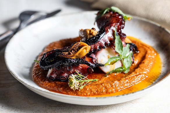 Grilled octopus and smoked mussels with romesco.