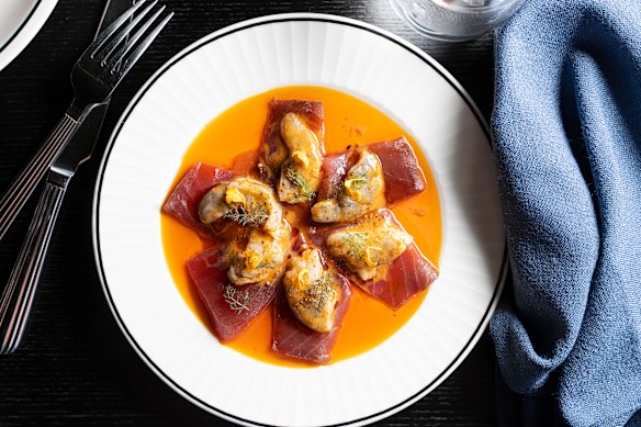 Tuna crudo topped with spice-cured prawns.