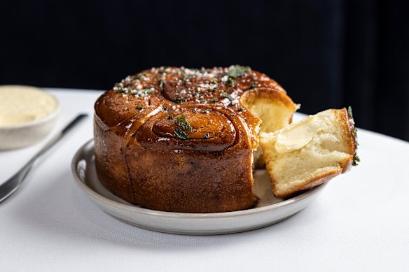 Bread, a crown-shaped brioche brushed with a caramel made from vegetable scraps, is complimentary.
