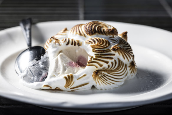 Bombe Alaska with gingerbread and a raspberry sorbet centre.